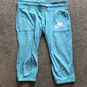 turquoise Nike cropped youth pants